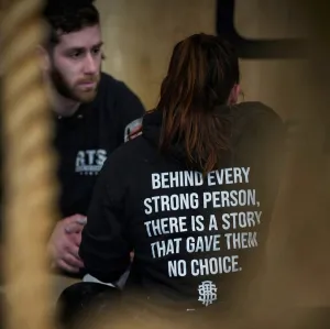 Behind Every Strong Person Hoodie